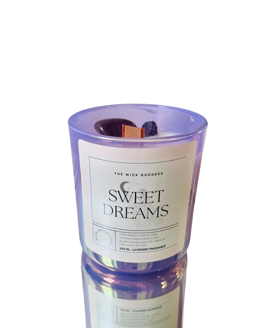 Candle with 'Sweet Dreams' label and lavender fragrance on a white background