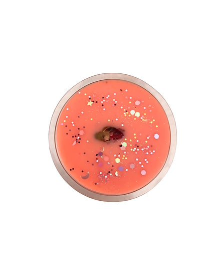 Coral-colored product with speckles on a white background