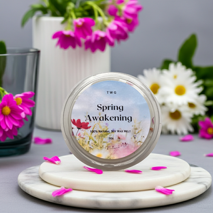TWG Spring Awakening soy wax melt with flowers and a vase in the background