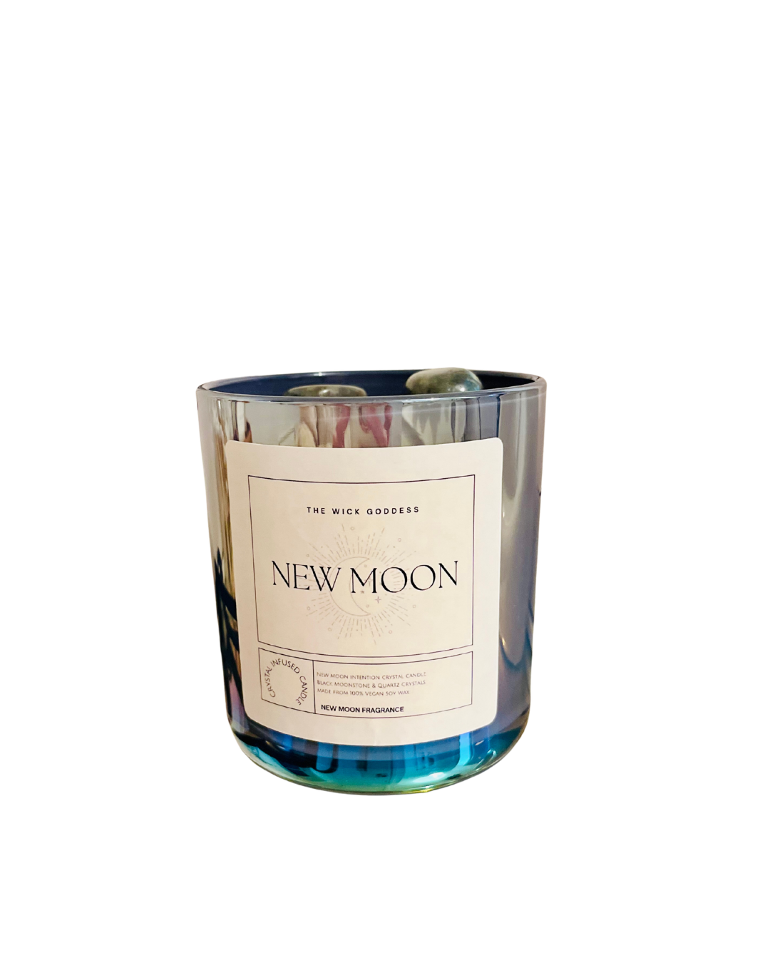 Candle labeled 'New Moon' with a colorful design on a white background