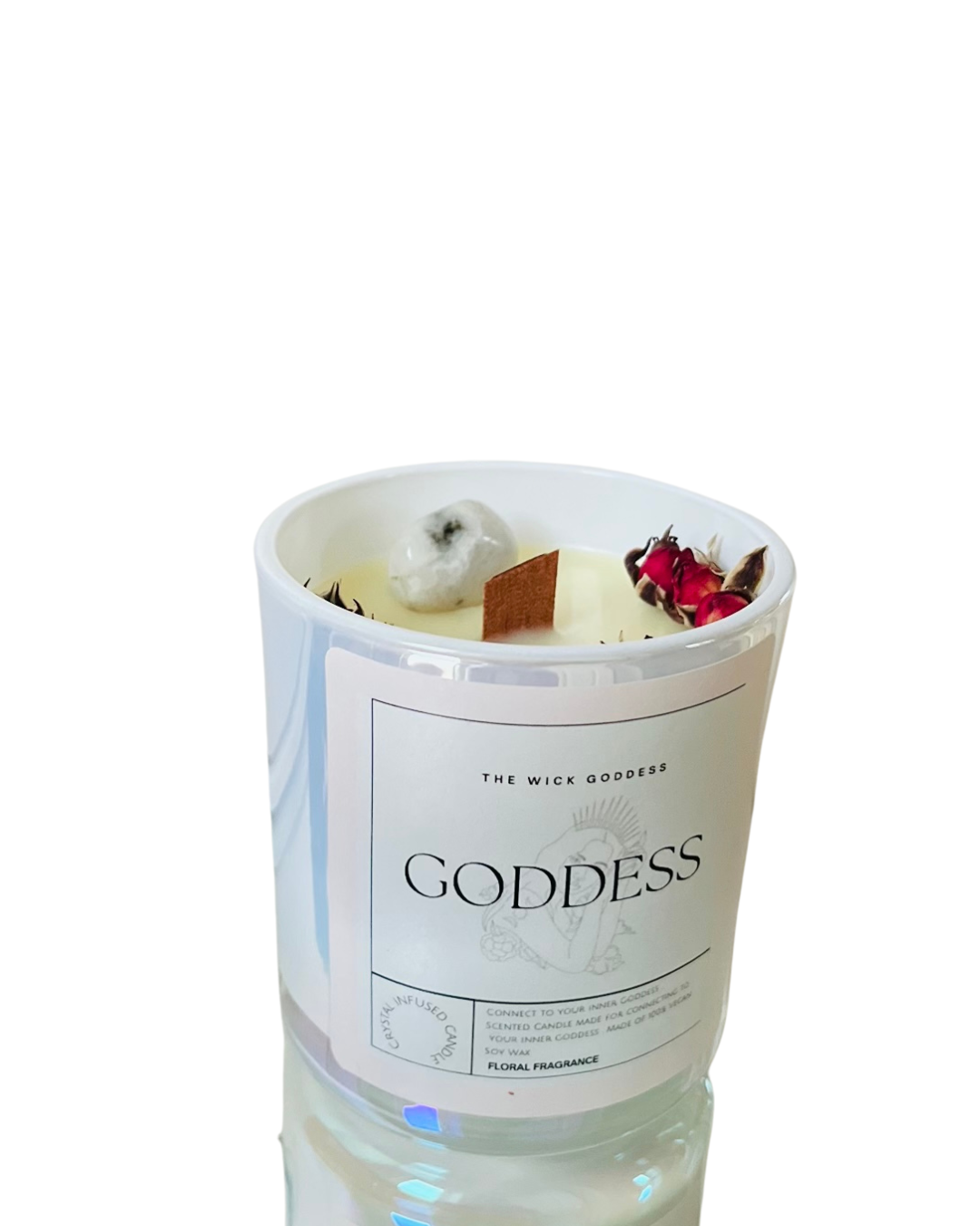 Candle in a glass jar labeled 'Goddess' with decorative elements on a white background
